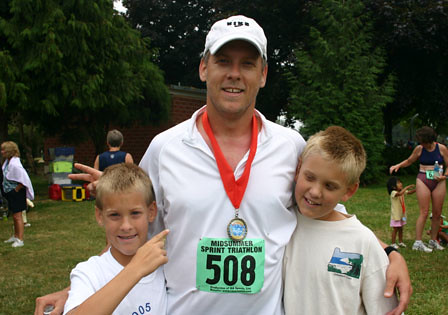 Chris' Finishing Photo at the Triathlon