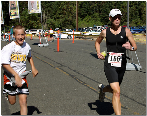 Julie finishing the Triathlon