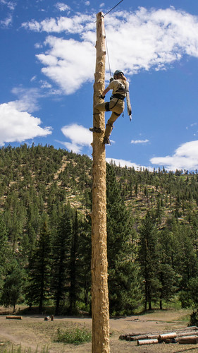 Julie descending from the spar pole